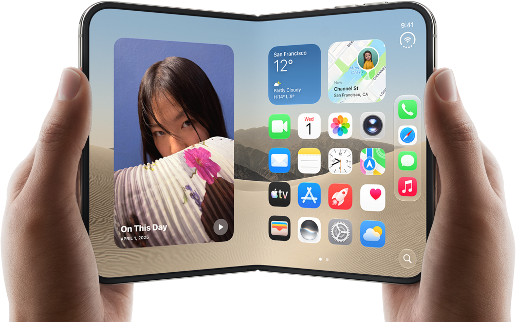 iPhone Duo, Star White colour, held by two hands in landscape orientation, unfolded, interior screen displays photos on the left, apps on the right