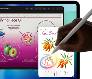 iPad Pro, front exterior display with dark blue and green gradient background with multiple apps open, hand holding Apple Pencil Pro circling a sketch showing Apple Intelligence Image Wand feature