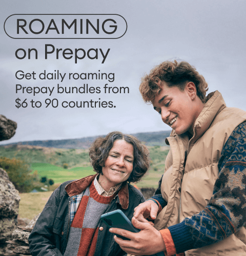 Scottish Mum and Jade on Stone Wall with a phone