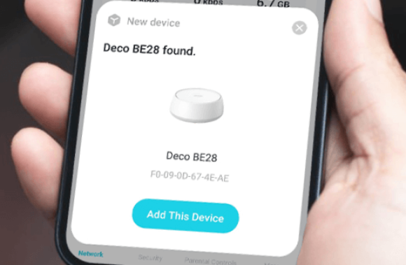 Smartphone screen showing a notification about a new device, Deco BE28 modem, with an option to add the device.