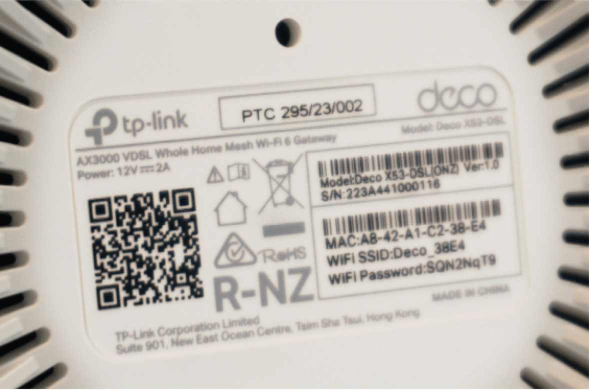 Base of a deco X53 modem showing WiFi login details