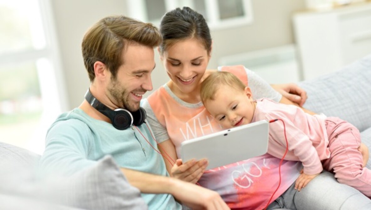 Family looking at a tablet