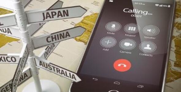 Samsung mobile next to flag post