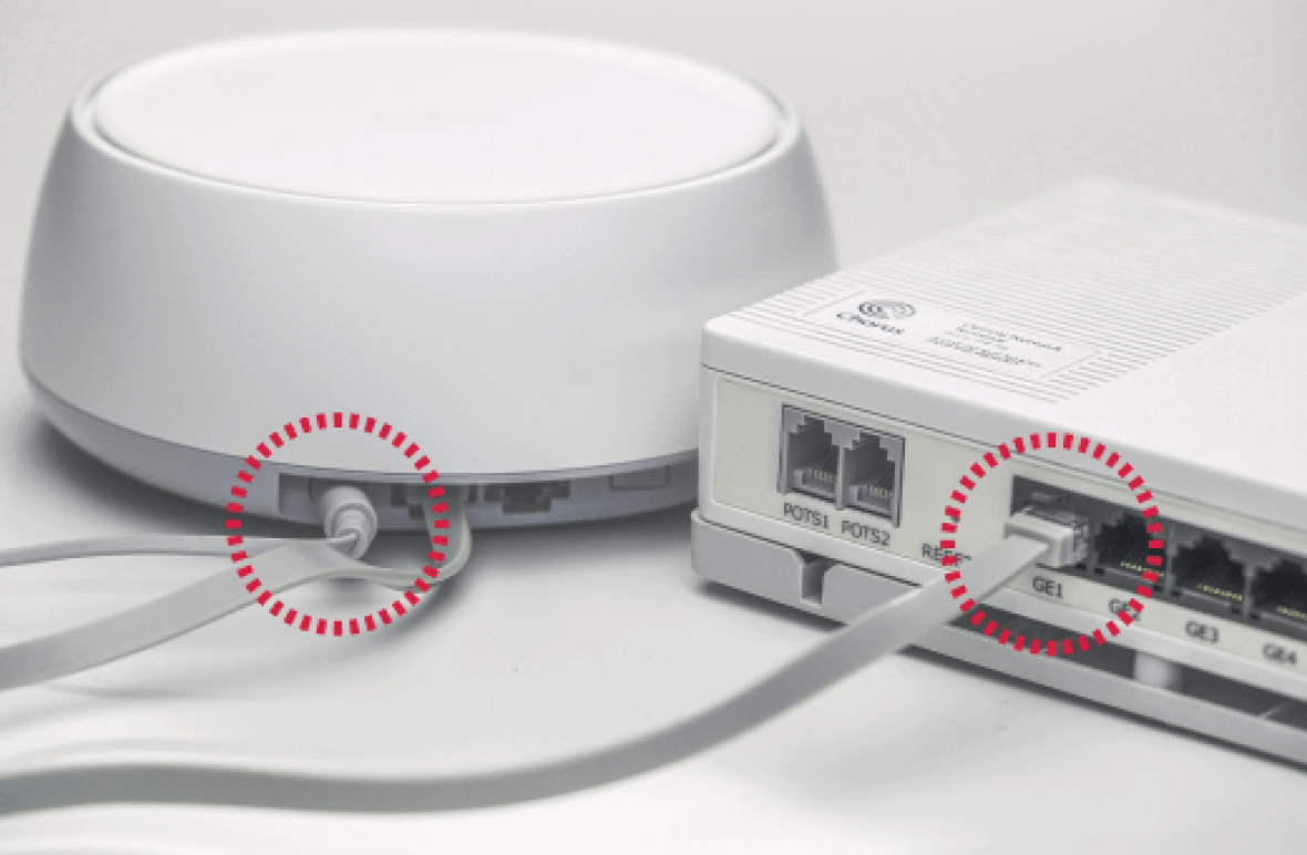 Smart WiFi router connected to a modem via Ethernet cables, showing highlighted ports for easy setup.