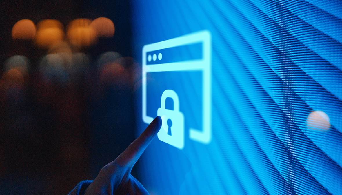 A finger pointing at a screen