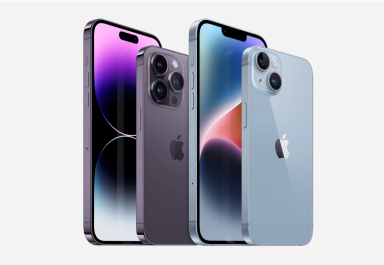 Four iPhone 14 models in different colours.