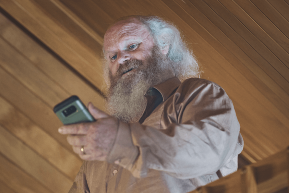 A man looking at his phone