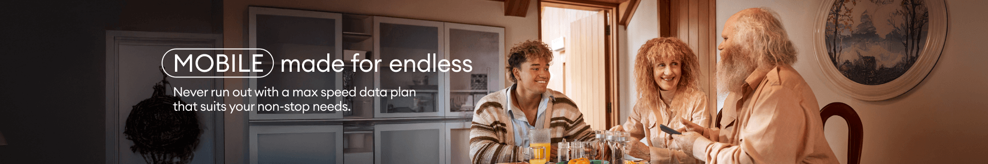 Jade and Mum and Dad at Dining Table smiling