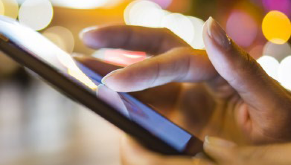 A close look at some using touch to explore on their phone.