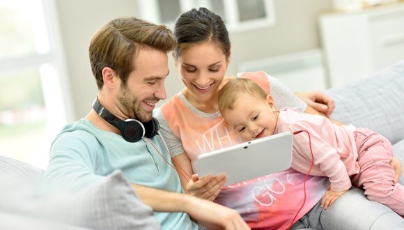 Family looking at a tablet